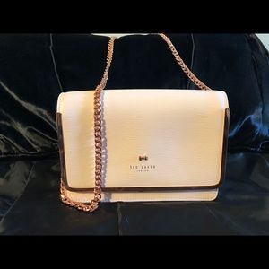 pink purse with rose gold chain